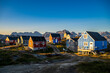 © robertharding - Colourful houses, Kulusuk, Greenland, Denmark, Polar Regions