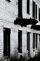 Poster - A monochrome image of a brick structure.
