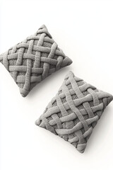 Cozy Cable Knit Pillow Pair: Two plush gray cable knit throw pillows, perfect for adding texture and warmth to any living space.  