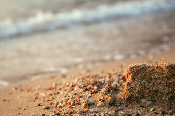 Wall Mural - Ruined sand castle at the seaside beach