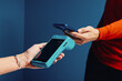 © Jacob Lund - Customer using smartphone for an electronic payment transaction