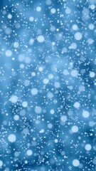 Leinwandbilder - Blue winter background with gently falling snowflakes, creating a serene and festive atmosphere