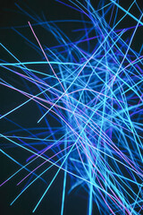 Poster - This image features vibrant blue and purple electric wire lines on a dark background, creating an energetic abstract visual effect.