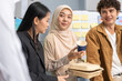 © Art_Photo - Diverse team professionals collaborating on sustainable development project during a corporate meeting, presentation eco-friendly designs with charts and data on renewable energy and green technology