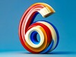 © VISUAL BACKGROUND - A number six made out of colorful plastic tubes on a blue background