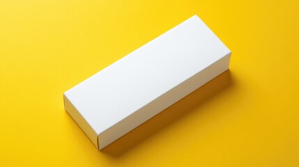 White box mock up against a yellow background flat lay style Space available for text insertion