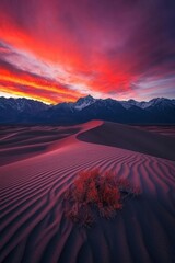 Poster - A stunning sunset over majestic mountains and tranquil dunes, showcasing nature's beauty and vibrant colors in a peaceful desert landscape.