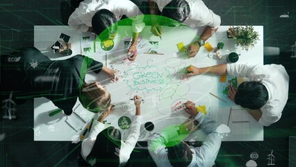 Top view of professional business team working together to brainstorm environmental idea by using mind map. Aerial view of smart manager talking and discussing about global connection. Alimentation.