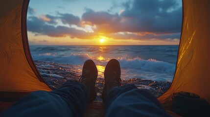 Aufkleber - The warm glow of the sunset reflects off the ocean waves as someone relaxes inside a tent, feet visible outside. The tranquil environment invites a sense of peace.