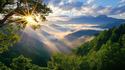 Poster - A foggy mountain range at dawn, with sunbeams breaking through the mist, illuminating the landscape below