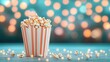 © ArtCookStudio - Large striped popcorn container filled with fresh popcorn on wooden table during festive occasion