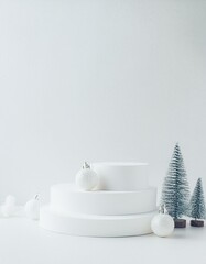 Wall Mural - Minimalist Winter Scene with White Platforms and Ornaments