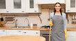 © Prostock-studio - Ready For Cleaning. Satisfied caucasian woman standing in kitchen, posing with mop, full length, copyspace