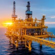 © PuiZera - Offshore oil rig at sunset, showcasing industrial infrastructure.