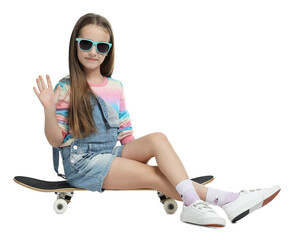 Stylish girl in glasses sitting on skateboard against white background