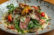 © artemstepanov - Veal and porcini salad. Warm salat with mushrooms in cream sauce, roasted meat beef fillet, cherry
