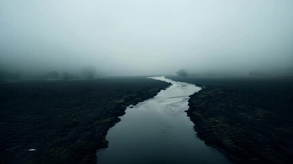 Aufkleber - Fog envelops a dark, winding river, creating a surreal and mysterious landscape. The atmosphere feels eerie and tranquil, inviting contemplation in a serene, dreamlike setting