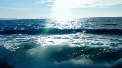 Poster - Sunlight creates a lens flare as waves crash in the deep blue ocean. This surreal collage shows a slightly different perspective in each frame