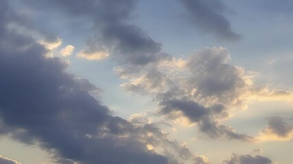 Poster - Ethereal clouds are continuously changing, creating intriguing and abstract forms against the vast expanse of the blue sky