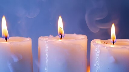 Poster - Three white candles burn steadily, melting wax dripping down as smoke wafts upward against a serene blue background, creating a tranquil and contemplative atmosphere