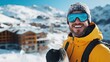© Lens Legacy - A cheerful man in a yellow jacket grips a snowboard under clear blue skies in a snowy village, capturing the essence of a joyful winter getaway.