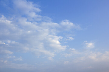 Wall Mural - 
It's a vanilla sky with feathery clouds.