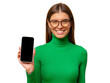 © Damir Khabirov - Portrait of smiling happy young woman holding blank phone screen with copy space
