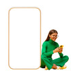 © Damir Khabirov - Young woman sitting on floor near huge phone mock up for app