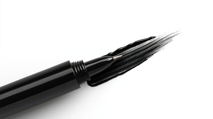 A close-up of a black marker tip, with ink smoothly flowing onto a white surface, showcasing its fine point and sleek design.