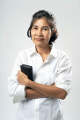  A middle-aged woman in a white shirt holding a wallet with a thoughtful expression, set against a white background. She appears to be contemplating financial matters.