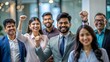 © N7 - A group of Indian professionals celebrating a milestone, with a soft blur of the office behind.