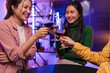 © aekachai - Asian women celebrating, meeting and chatting in a bar. Places to visit, beautiful lights