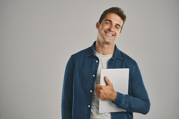 Poster - Happy, portrait and tablet with man in studio isolated on gray background for app download or update. Ecommerce, social media and website with smile of user in casual outfit for online shopping
