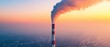 © Dirty Pure - Industrial Smoke Plume Rising Against a Vibrant Sunset Sky