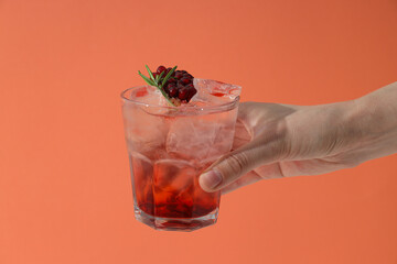 Wall Mural - Red cocktail with fresh pomegranate on the table