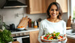 © drimerz - smiling woman preparing salad in kitchen