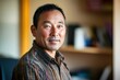 © Jaemie - Portrait of a Bhutanese man in a colorful shirt, showcasing traditional expressions and warm lighting for cultural representation.