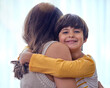 © peopleimages.com - Hug, support and adoption with family at home for foster care, bonding and love. Child welfare, placement success and security with mother and son embrace in living room for happiness together
