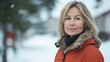 © Sanych - Middle-aged Swedish woman with blonde hair and a winter jacket.