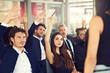 © peopleimages.com - Group, business people and raising hand with diversity in seminar for presentation, pitch or proposal. Teamwork, collaboration and employee engagement for discussion or conference in corporate office