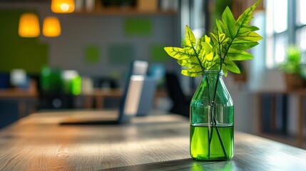 Wall Mural - Green Leaves in a Glass Bottle on a Wooden Desk in an Office Setting, Depicting the Concept of Sustainable Business Practices and Environmental Awareness