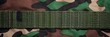 © Shutter2U - Close-up of green camouflage webbing.