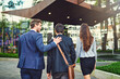 © Penn/peopleimages.com - Business people, back view or walking in city with friends in street for partnership, collaboration or teamwork. Real estate agents, realtors or outdoor buildings for travel, commute or urban project