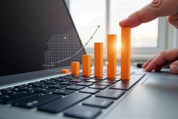 Poster - A person is holding a bar graph right above a laptop keyboard