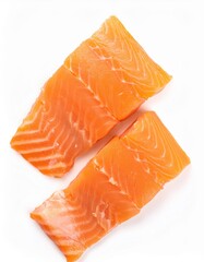 Two fresh salmon fillets lying on white background