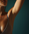 © Di Studio - close up of smooth female armpit over green background with copy space, epilation and beauty concept