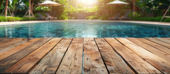 Poster - Wood Table Top Of The Background And Pool