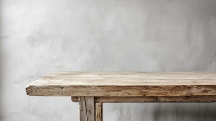 Poster - A rustic wooden table with a light grey backdrop highlighting its natural texture and warmth ideal for creating a cozy dining or workspace ambiance