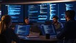© kitipol - Very realistic photo of a dynamic Cyber Security Development Team AI literacy session in a tech-forward office. Laptops and large digital screens displaying coding and data visualizations support the