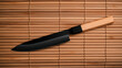 © Kingdola - Chinese knife on a bamboo mat, authentic kitchen style, detailed wood textures, clean blade